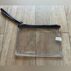 🩷 Clear wristlet hand bag with black strap estimated 9”x7”
